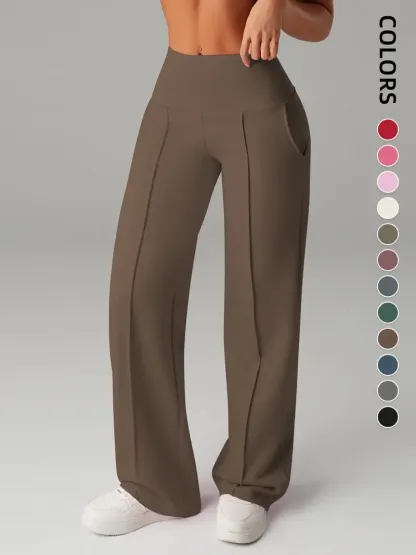 Pantalones de mujer de tiro medio, cintura elástica y pernera ancha; estilo deportivo casual, cómodos bolsillos laterales; prenda versátil para primavera y otoño; ideales para el día a día; moda femenina.